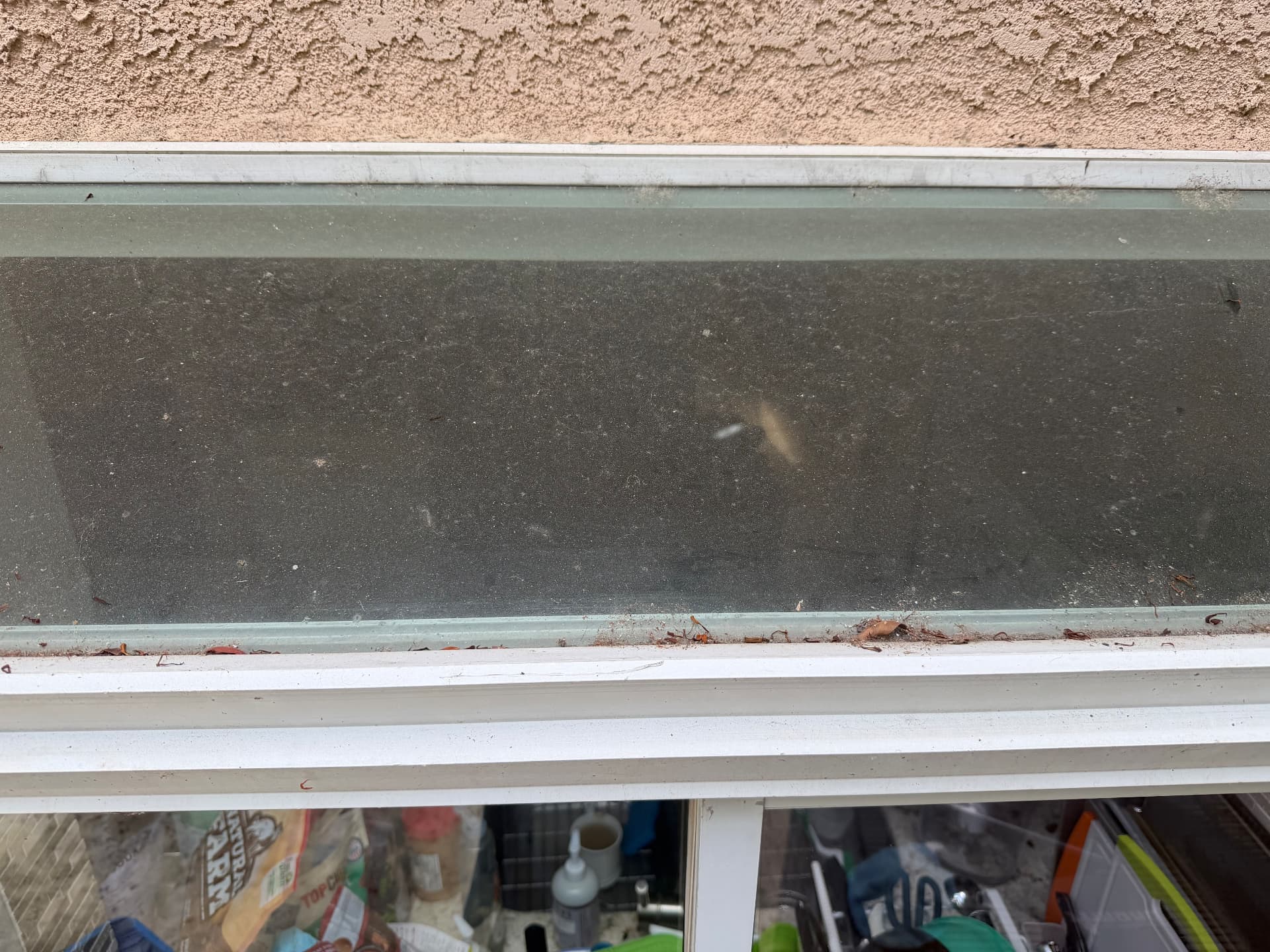 Transom window & track before cleaning