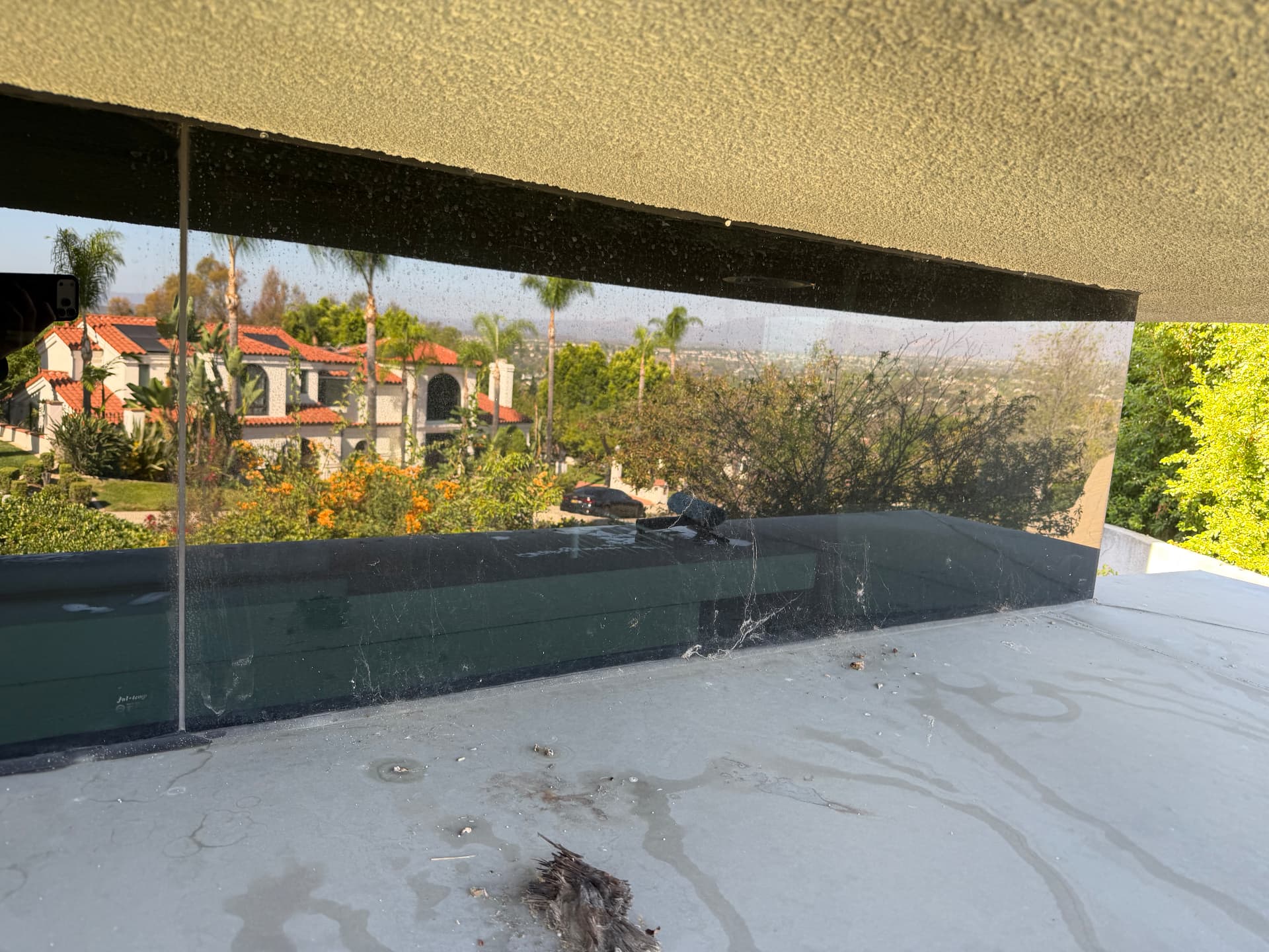 Hillside view panels before cleaning